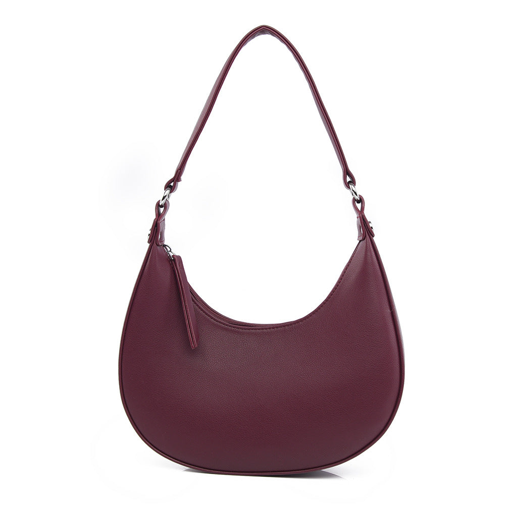 Niche design crescent shaped handbag for women