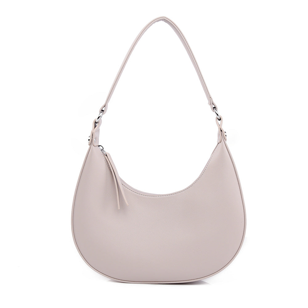 Niche design crescent shaped handbag for women