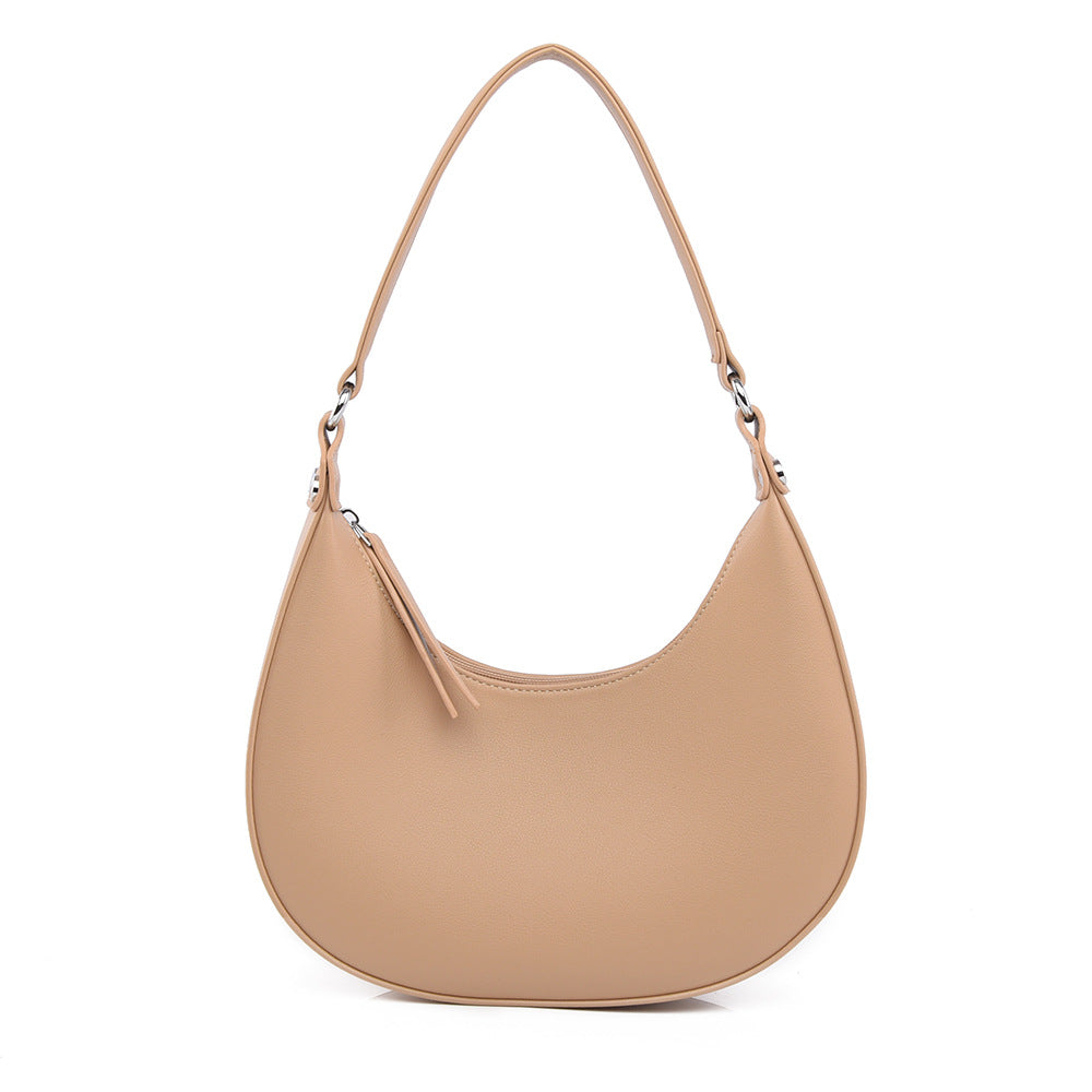 Niche design crescent shaped handbag for women